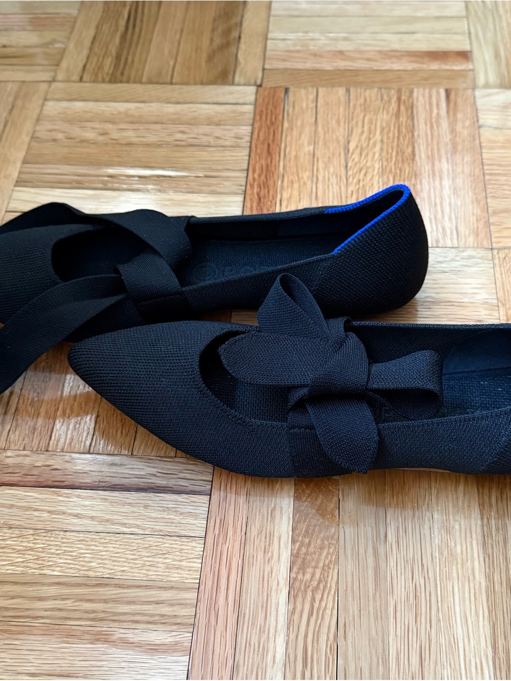 Rothy's Black Pointed Knit Flats with Bow Accent and Blue Trim - Picture 2 of 4